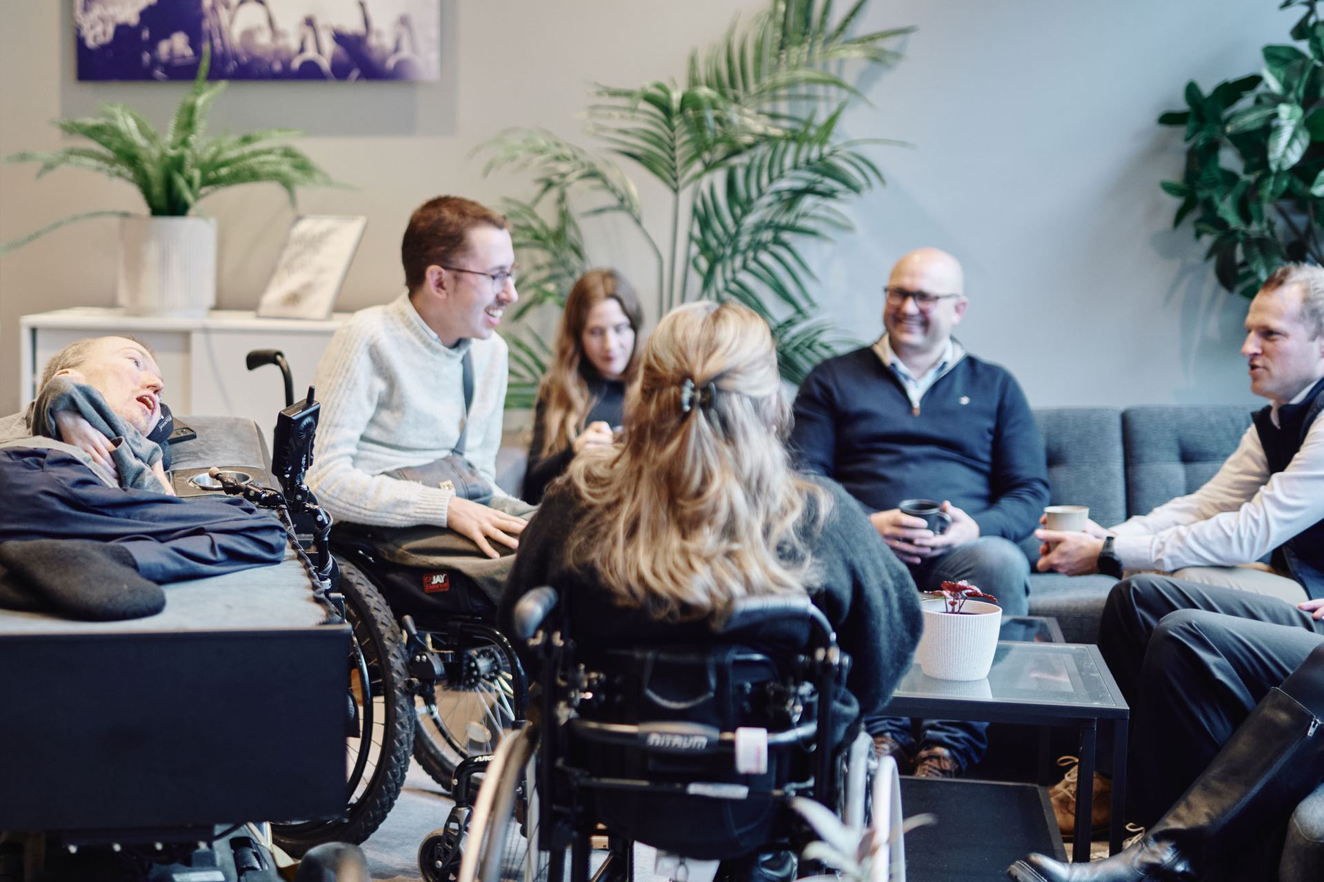 Care situation with people in a modern, homely setting